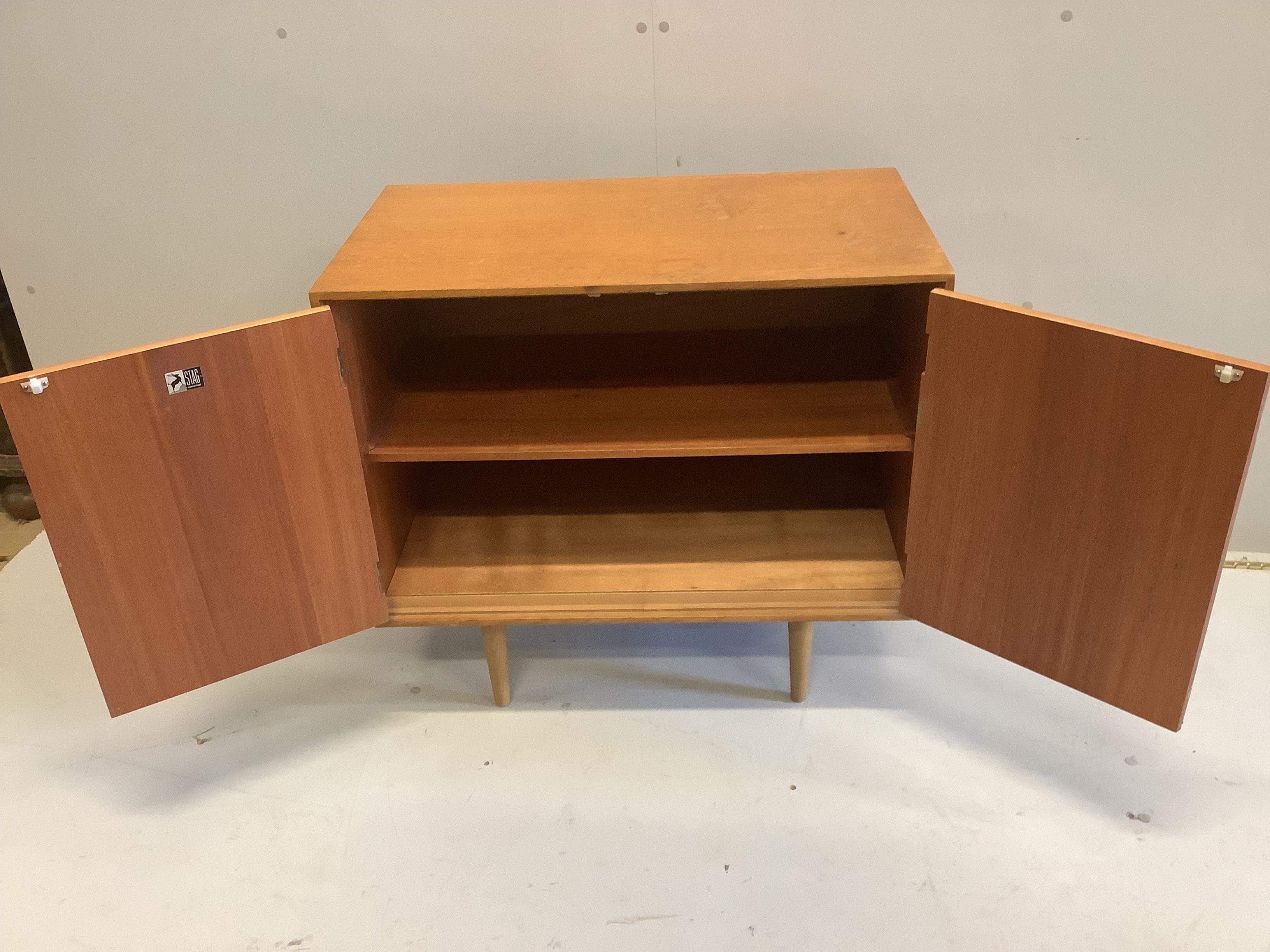 A mid century Stag teak two door low cabinet, width 76cm, depth 43cm, height 70cm
